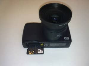 Bottom of the GR III with battery compartment.